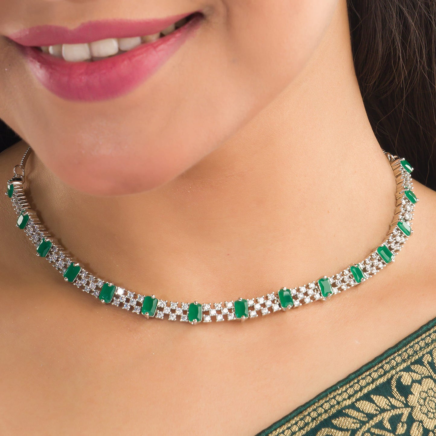 ZIRCON NECKLACE WITH GREEN STONE ADDS A POP OF VIBRANT ELEGANCE.