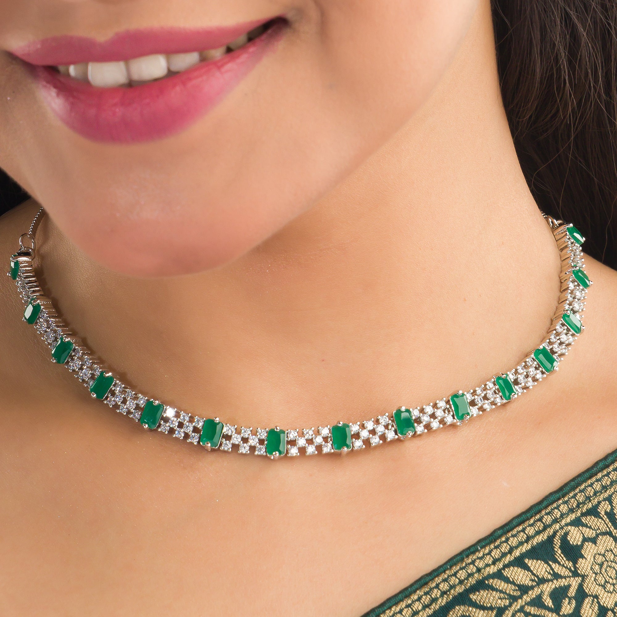 "Green stone zircon necklace adds a pop of vibrant elegance to any look."
