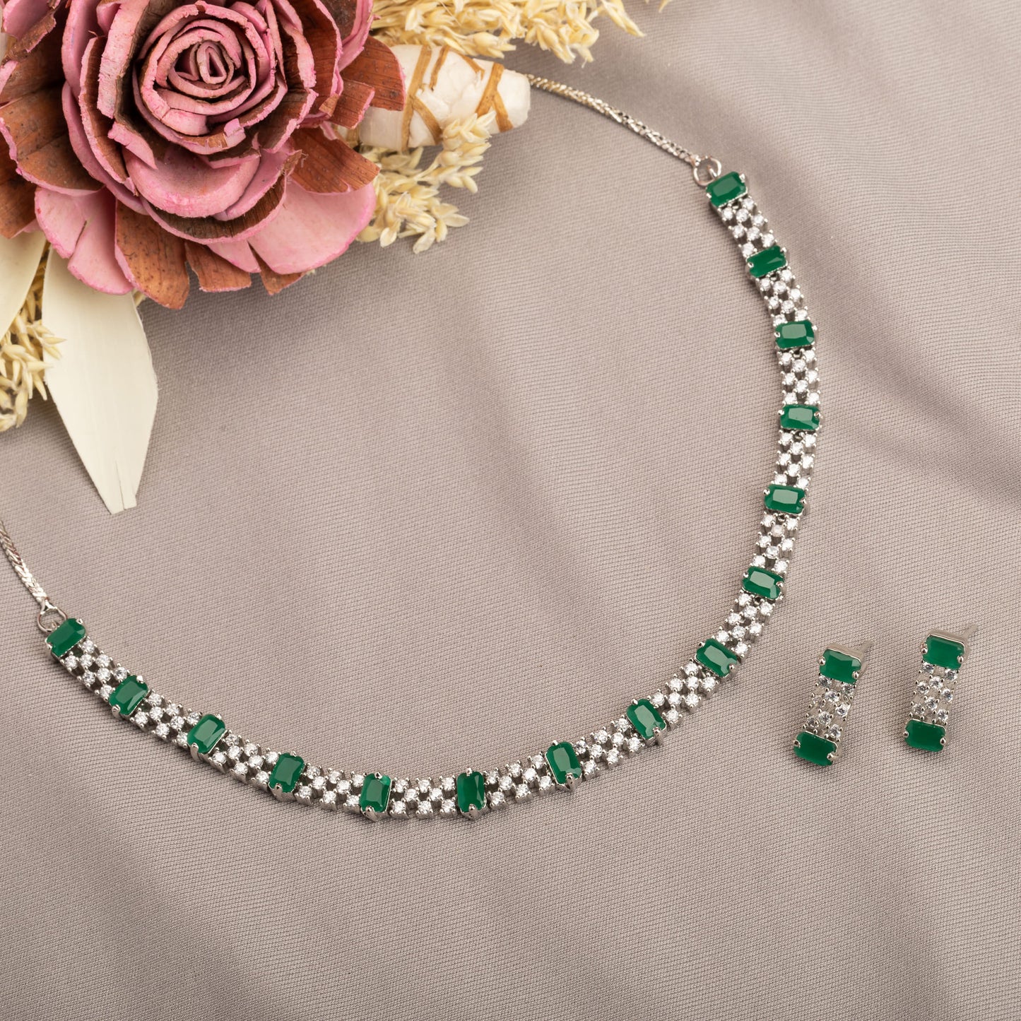 ZIRCON NECKLACE WITH GREEN STONE ADDS A POP OF VIBRANT ELEGANCE.