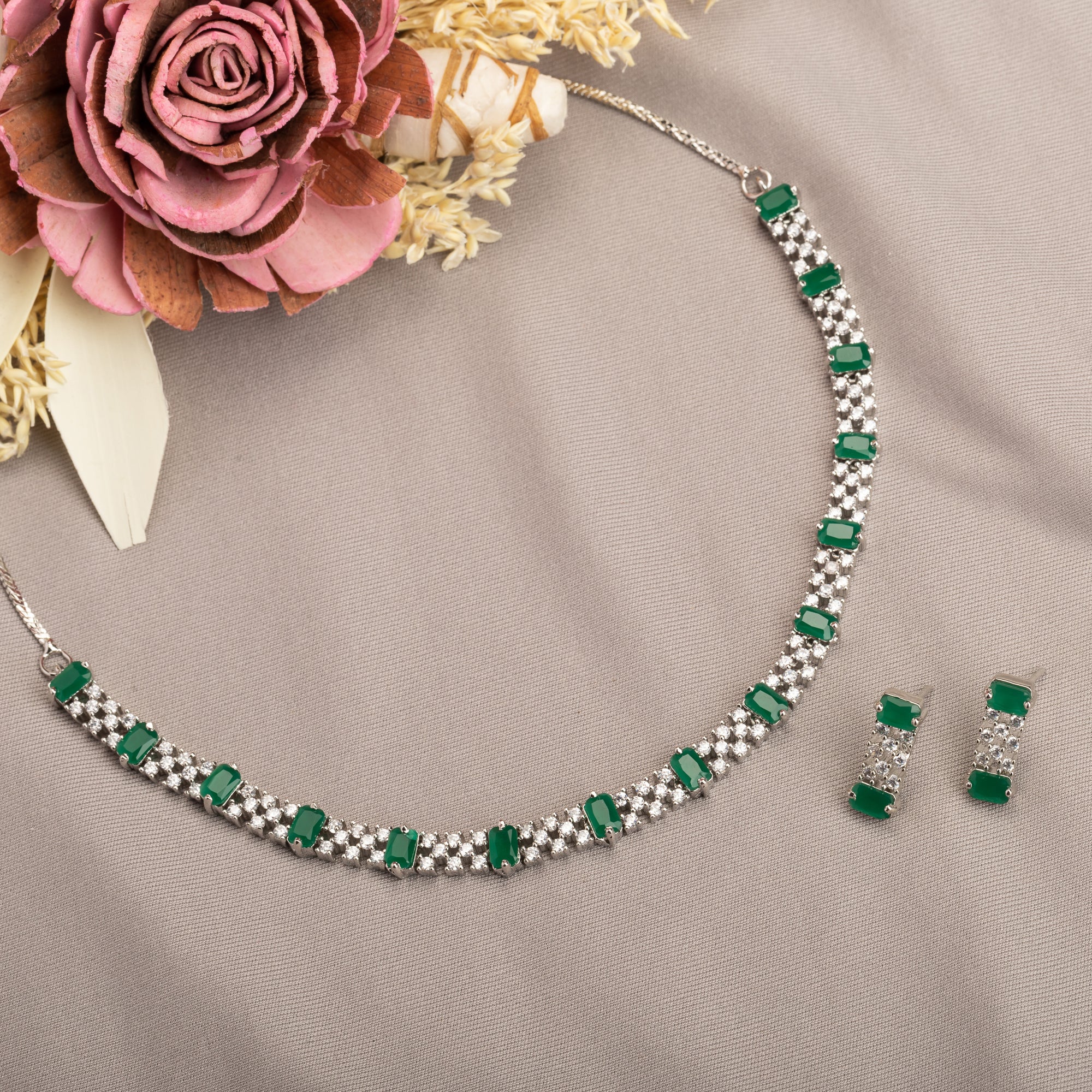 "Green stone zircon necklace adds a pop of vibrant elegance to any look."
