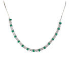 "Green stone zircon necklace adds a pop of vibrant elegance to any look."
