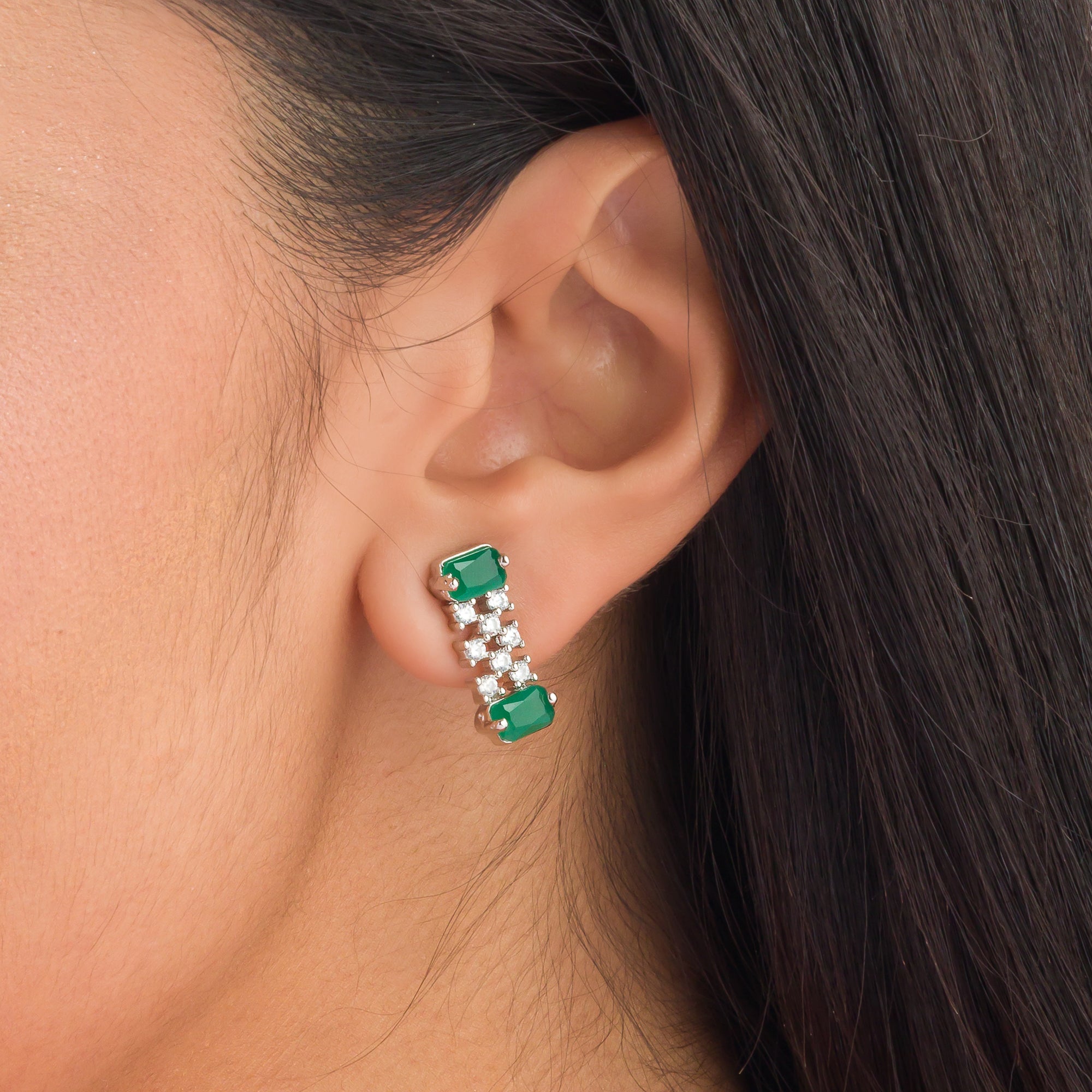 "Green stone zircon necklace adds a pop of vibrant elegance to any look."
