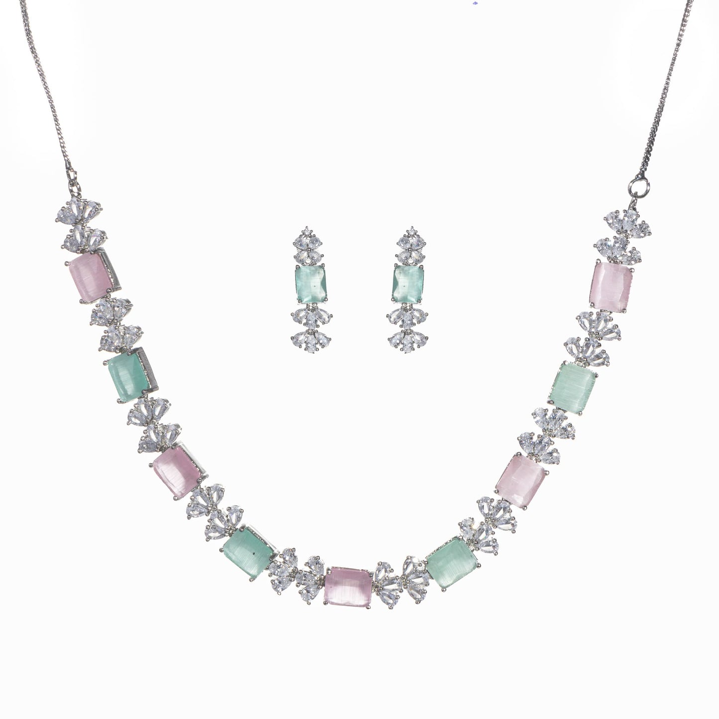 A TRENDY PINK AND GREEN ZIRCON NECKLACE IN A SQUARE DESIGN ADDS CHIC CHARM.