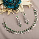 "Green and white zircon necklace in floral design adds vibrant, floral elegance."
