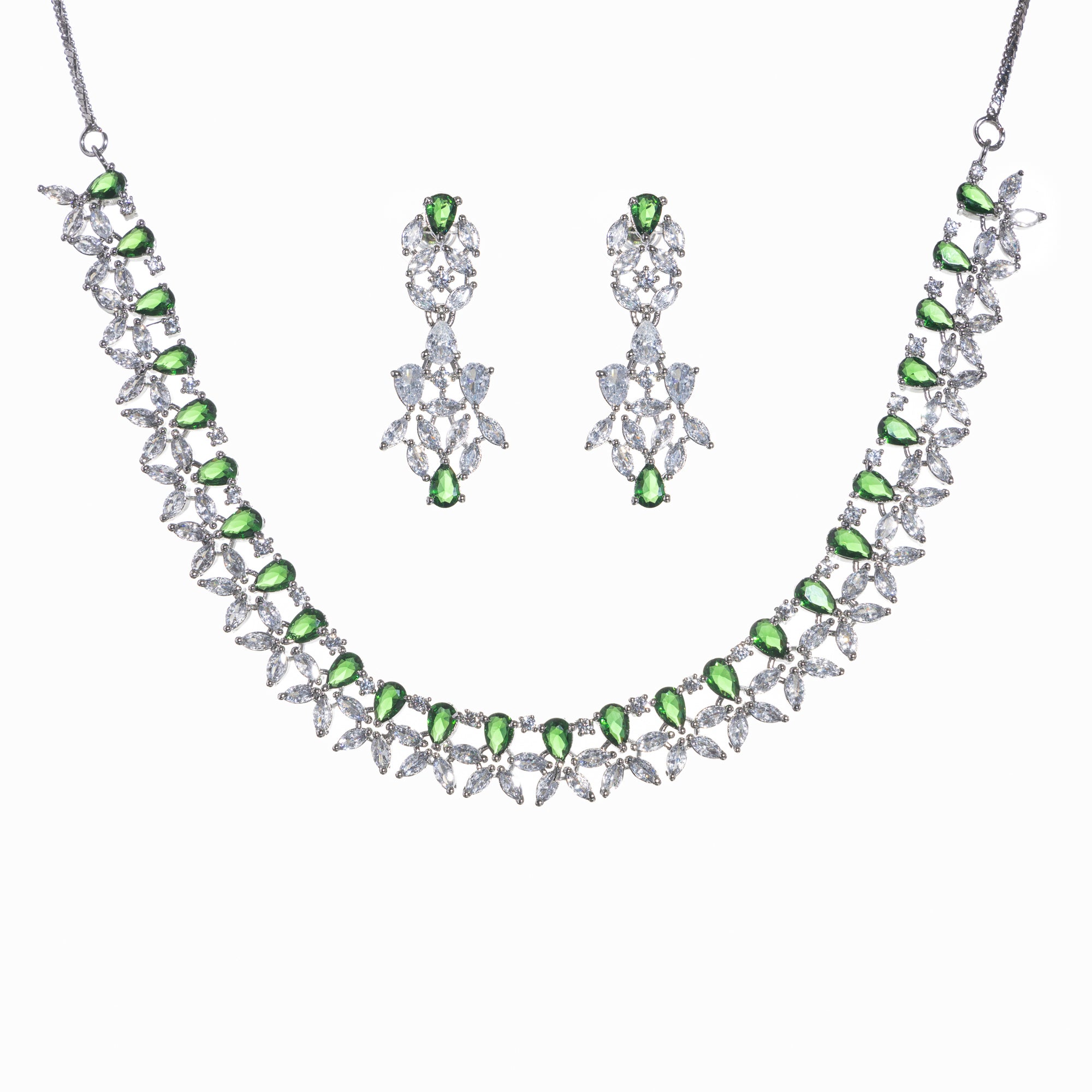 "Green and white zircon necklace in floral design adds vibrant, floral elegance."
