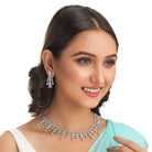 "Zircon necklace sparkles with dazzling brilliance for a sophisticated look."
