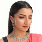 1. "Pink and white zircon necklace with silver polish creates a stunning, radiant look."
