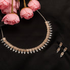 "Bronze and white zircon necklace exudes elegant contrast for a refined finish."
