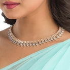 "Bronze and white zircon necklace exudes elegant contrast for a refined finish."
