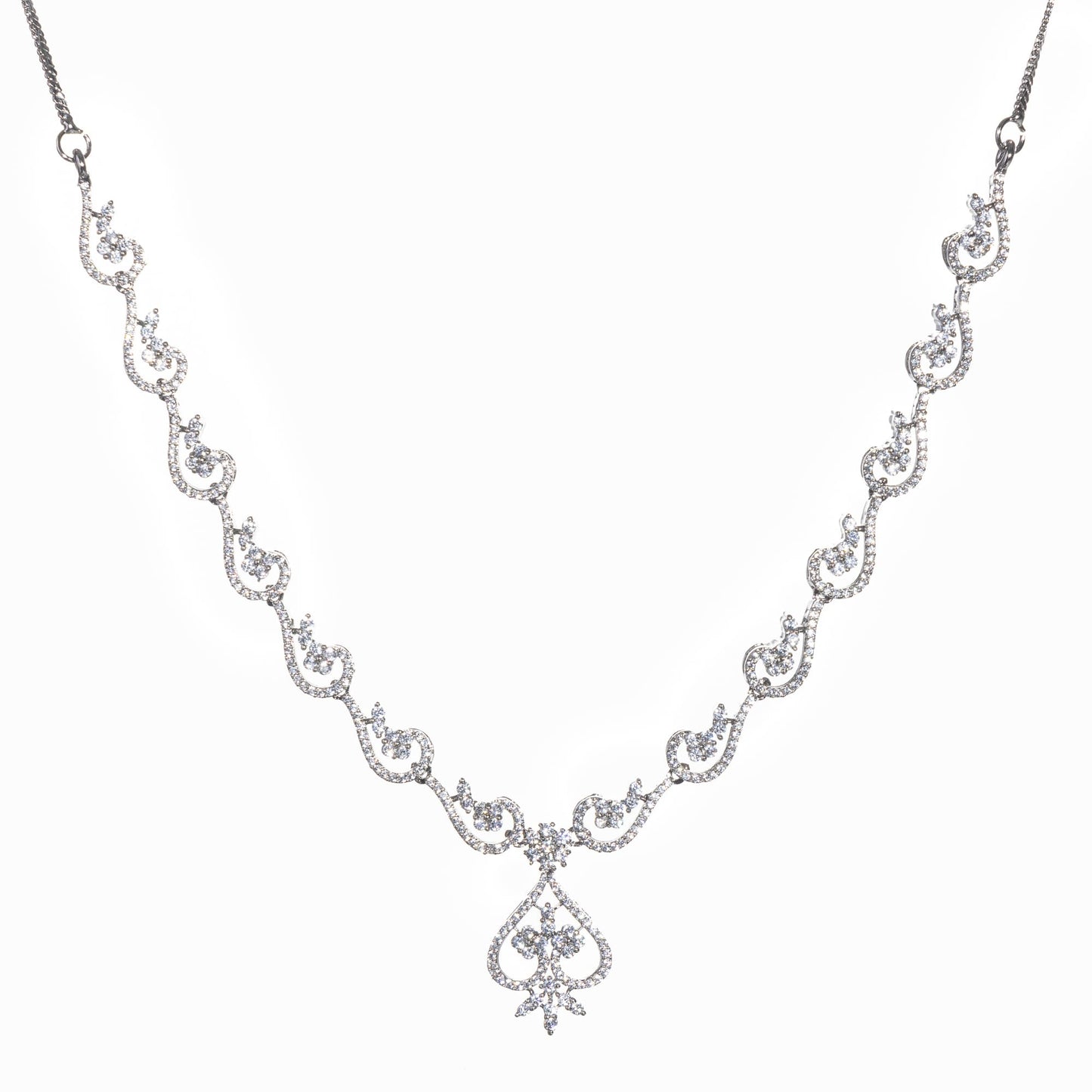 A ZIRCON NECKLACE SPARKLES WITH DAZZLING BRILLIANCE.