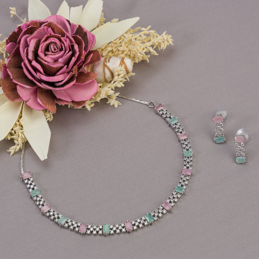 VIBRANT ZIRCON NECKLACE SHOWCASING A STRIKING COMBINATION OF PINK AND GREEN ZIRCONS FOR A COLORFUL, EYE-CATCHING DESIGN.