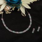 "Vibrant pink and green zircon necklace offers an eye-catching, colorful design."
