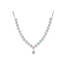 "Aqua zircon necklace with rose gold polish radiates modern elegance."
