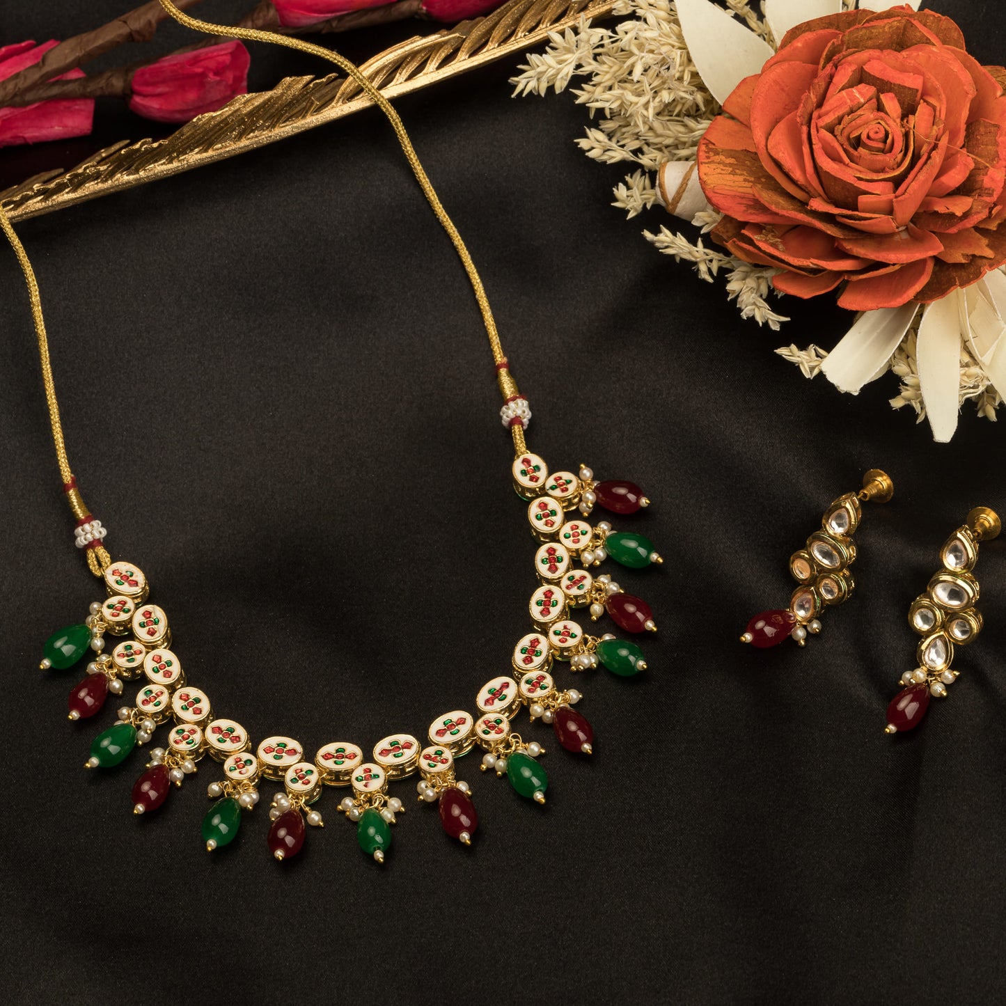 ELEGANT KUNDAN NECKLACE FEATURING RICH GREEN AND MAROON STONES FOR A REGAL AND SOPHISTICATED LOOK.