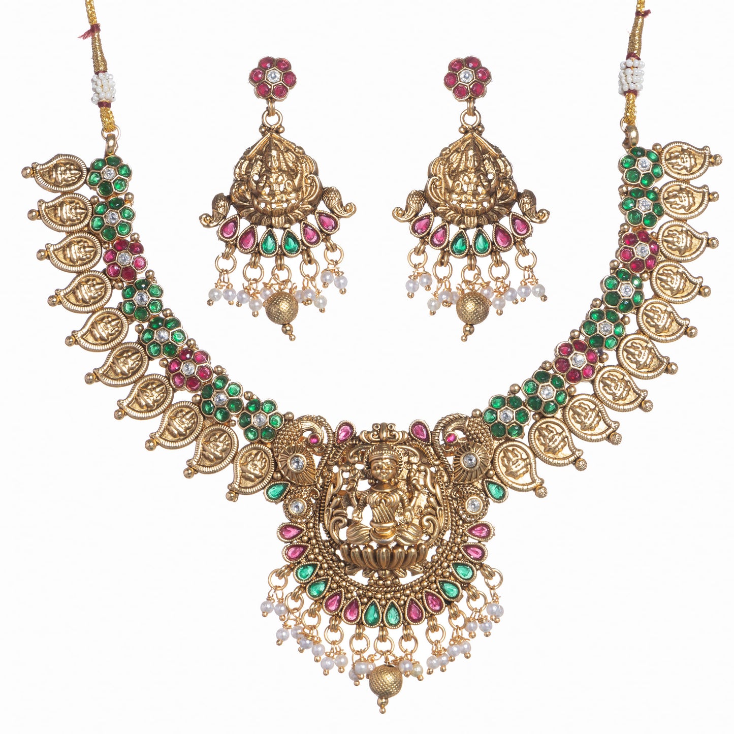 BEAUTIFUL TEMPLE JEWELRY SHOWCASING INTRICATE DESIGNS IN RED, GOLD, AND GREEN FOR A CLASSIC AND ELEGANT TOUCH.