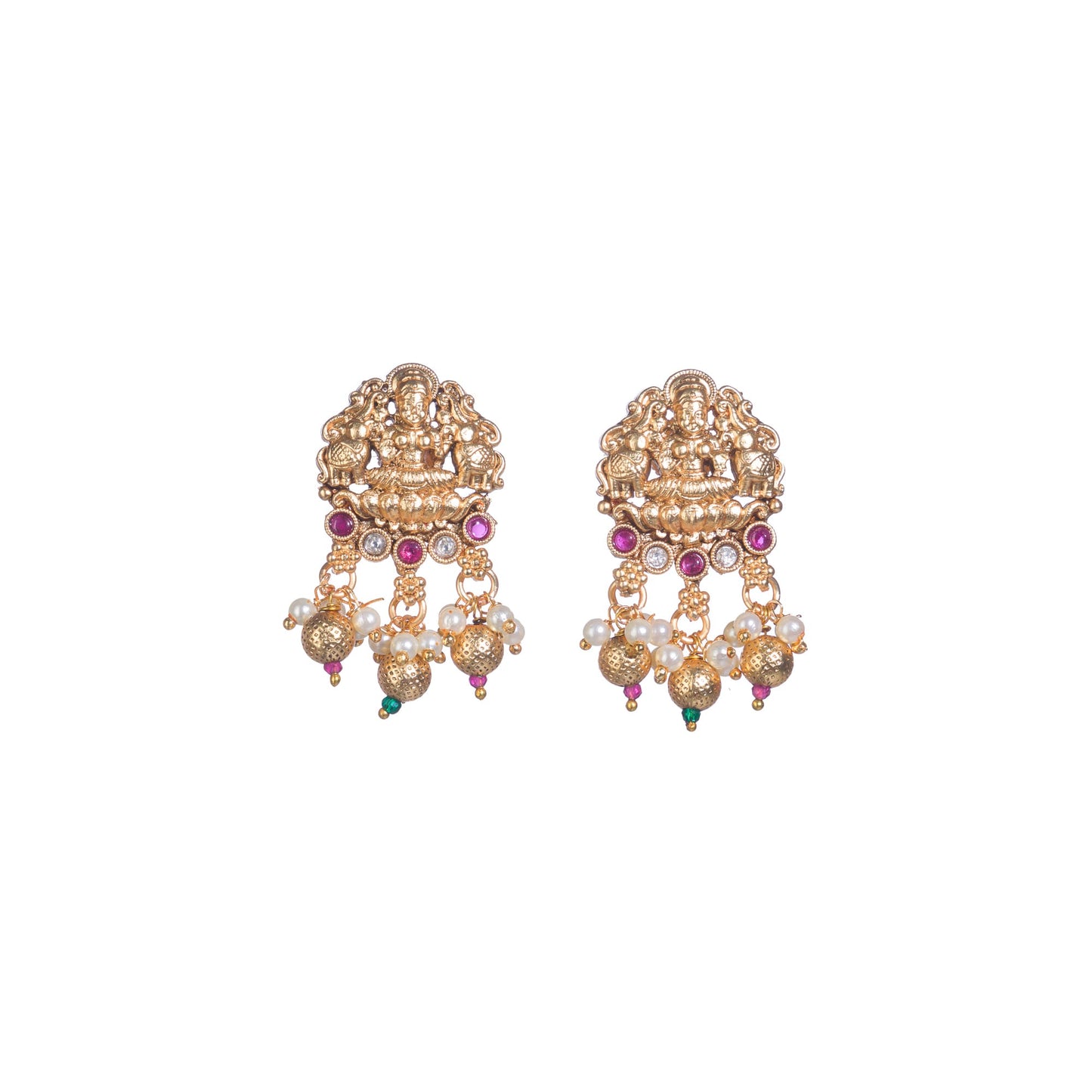 A TEMPLE JEWELLERY WITH RED AND GREEN STONES SHOWCASES TRADITIONAL OPULENCE.