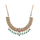 Temple necklace with green Kundan stones radiates vibrant, traditional festival elegance.
