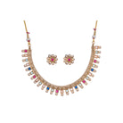 Short necklace with vibrant multi-color stones brings playful flair to festive attire.
