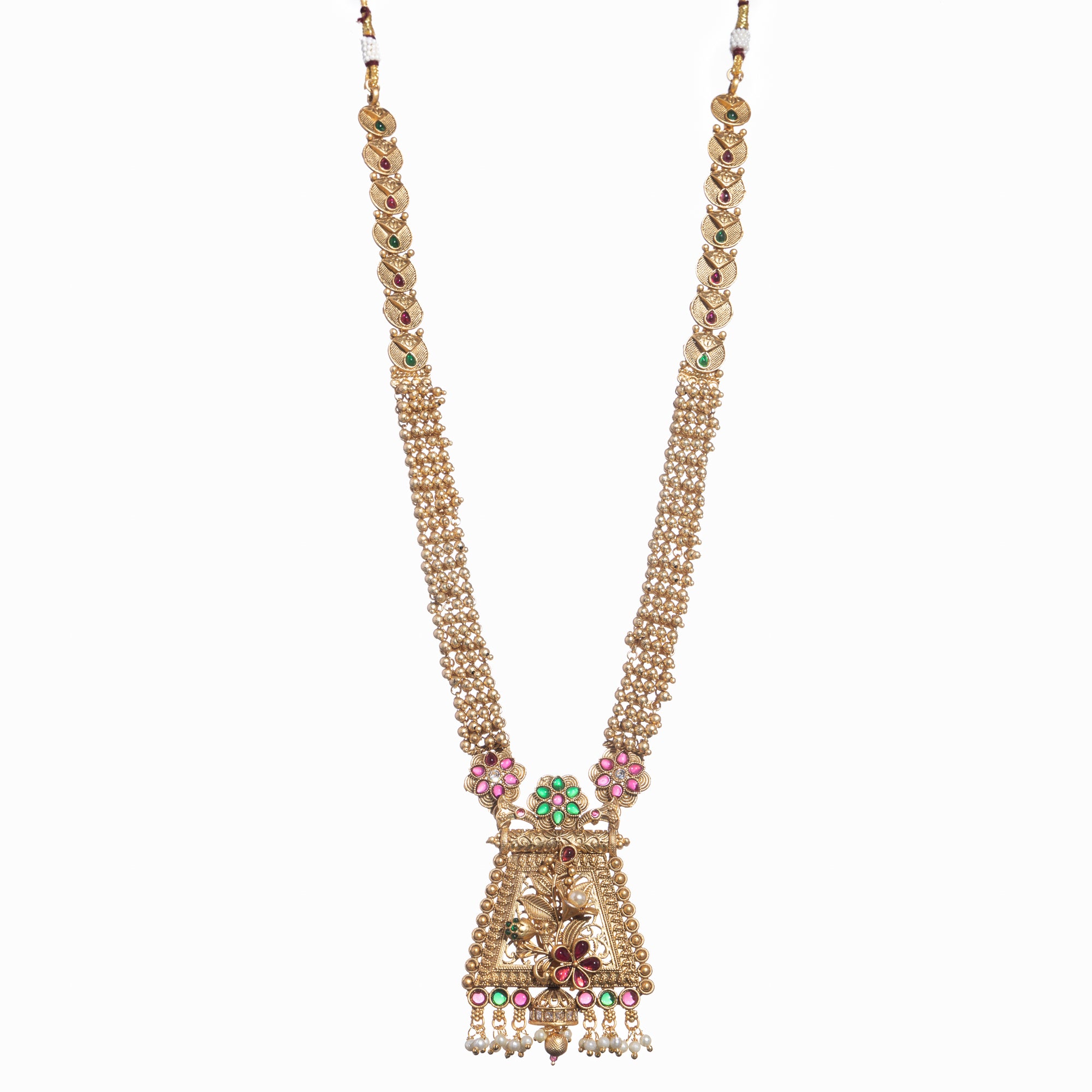 Long temple necklace with white pearls radiates timeless golden elegance for festive occasions.
