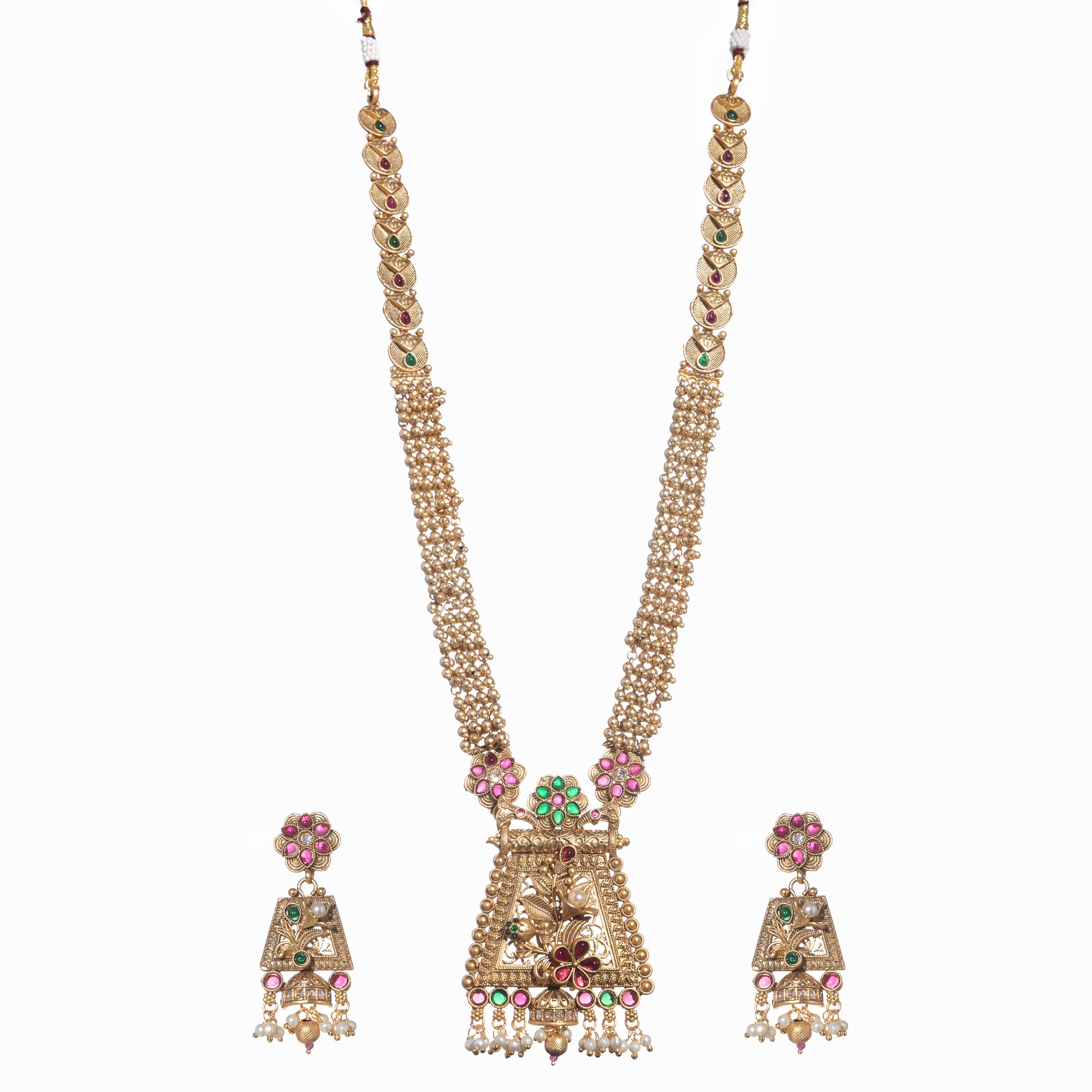 Long temple necklace with white pearls radiates timeless golden elegance for festive occasions.
