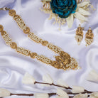 Luxurious temple long necklace with white pearls radiates opulence and refined elegance for festivals.
