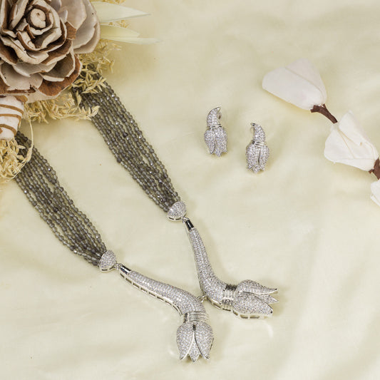 A TRENDY LONG NECKLACE WITH GREY AND SILVER ZIRCON TOUCHES COMBINES MODERN STYLE WITH A SLEEK, SOPHISTICATED SPARKLE.