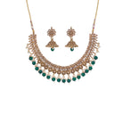 "Stylish gold-tone necklace with green Kundan for vibrant, elegant appeal."
