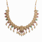 Gold-tone temple necklace set with golden beads offers timeless elegance
