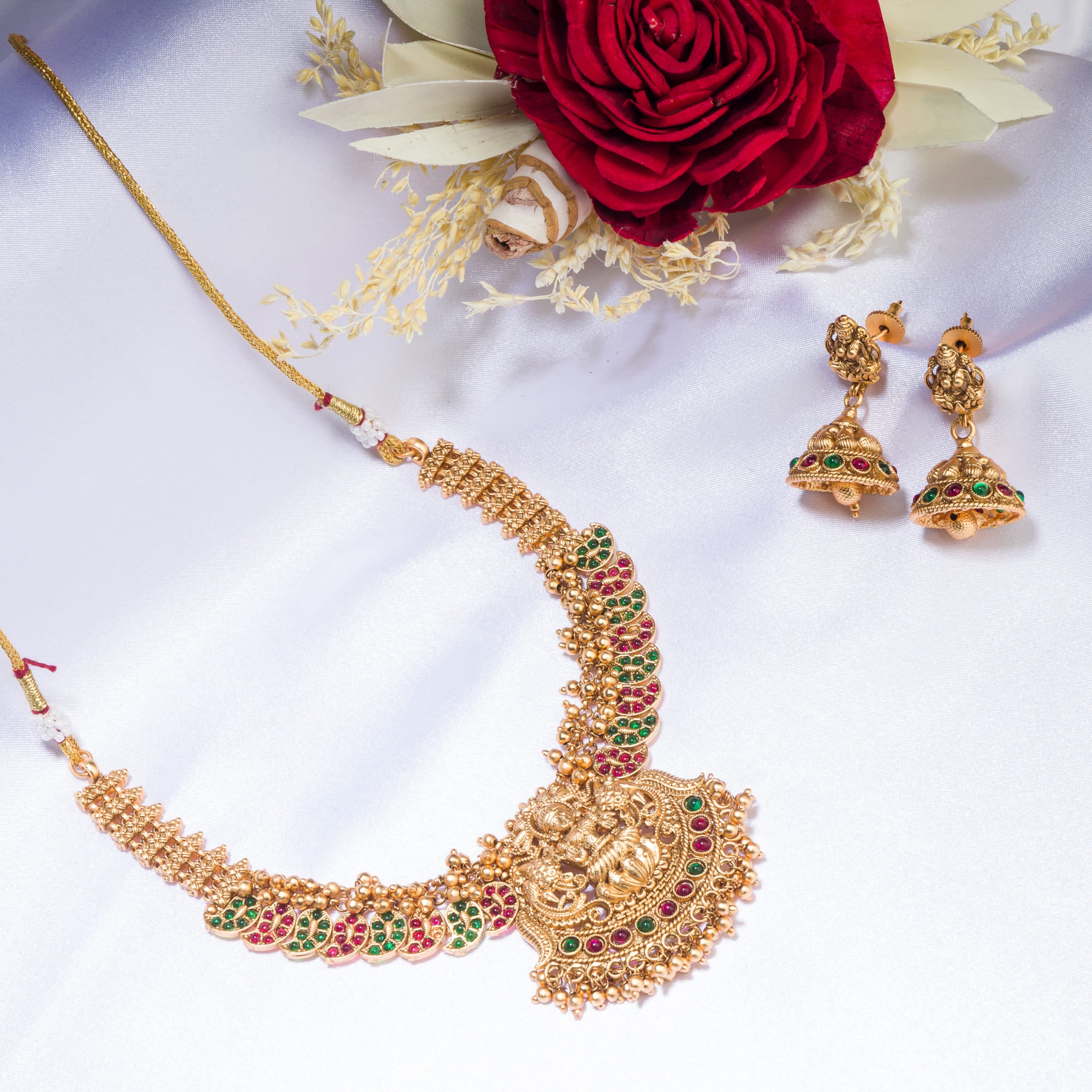 Traditional short temple necklace set, showcasing intricate craftsmanship and charm.
