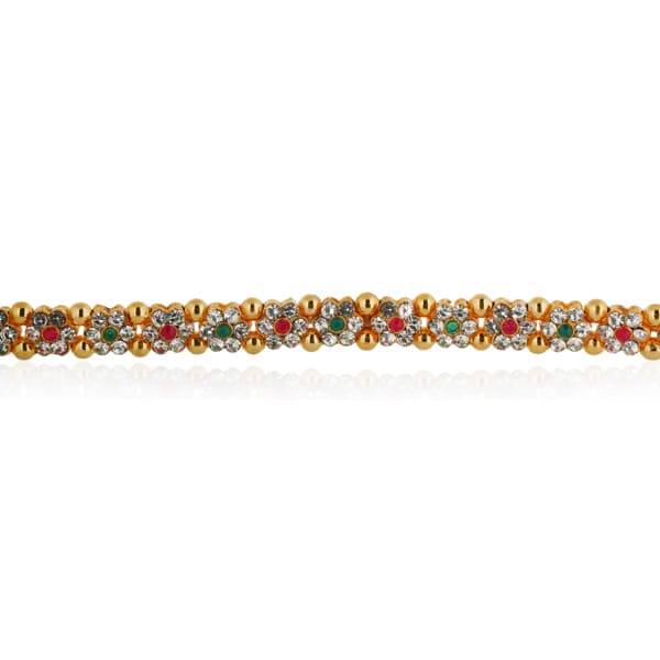 A KAMARBAND IS A DECORATIVE WAISTBAND TRADITIONALLY WORN IN SOUTH ASIAN CULTURES, OFTEN ADORNED WITH INTRICATE DESIGNS AND EMBELLISHMENTS.