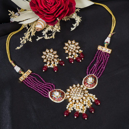 PINK KUNDAN WITH GOLD-TONE POLISH ADDS A VIBRANT, ELEGANT TOUCH.