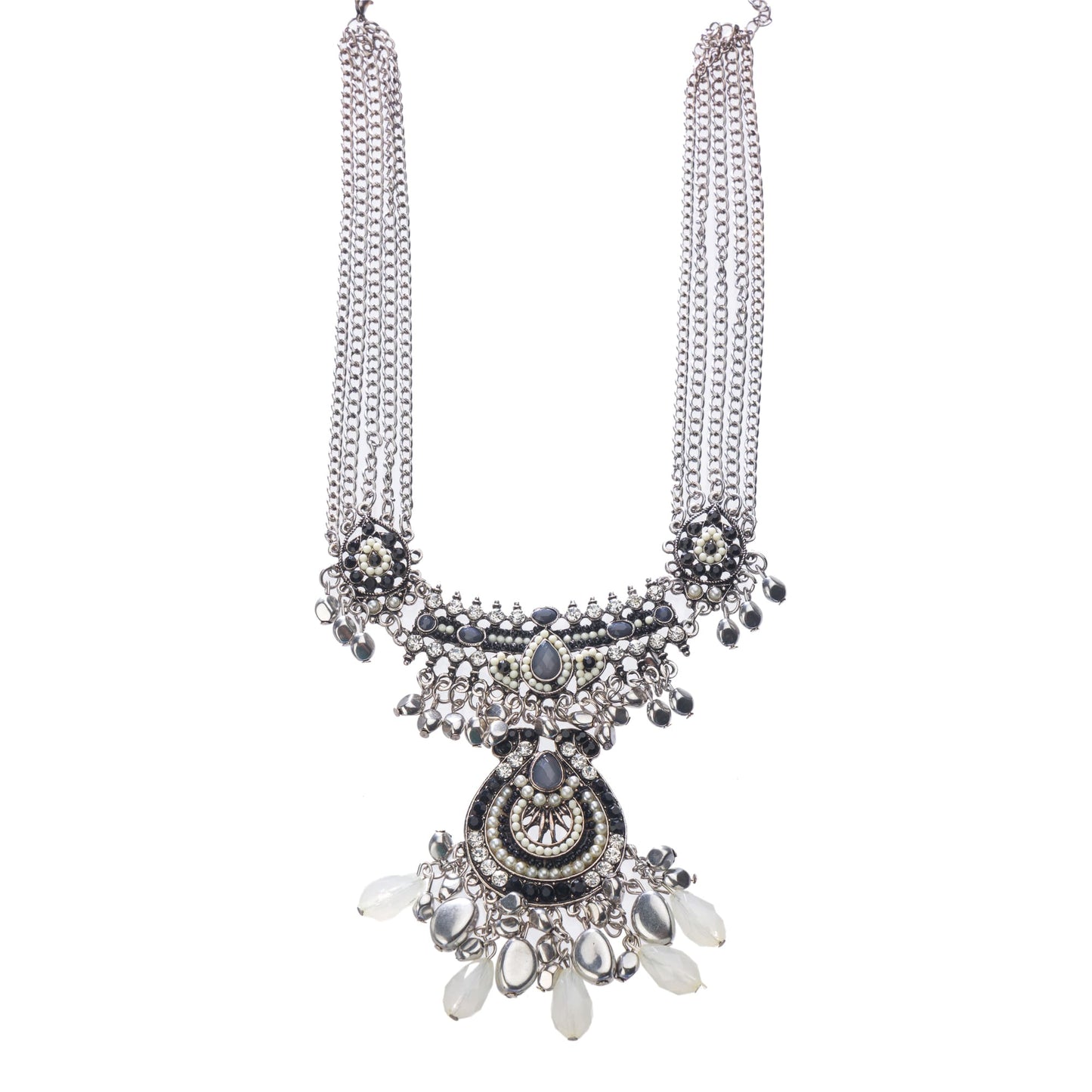 AN OXIDIZED SILVER NECKLACE WITH BLACK AND WHITE BEADS ADDS STYLISH CONTRAST.