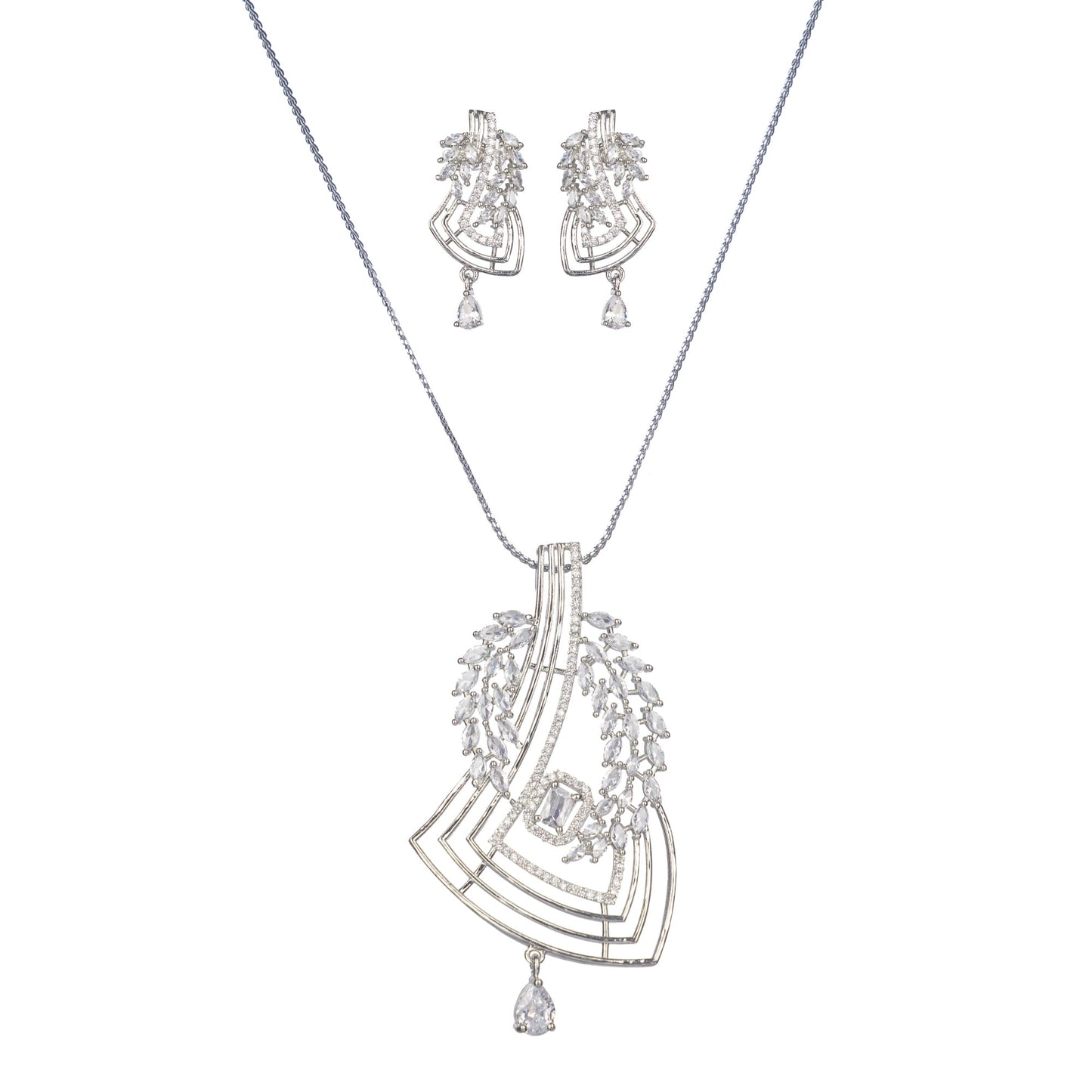 A SILVER ZIRCON PENDANT SET SHINES WITH REFINED ELEGANCE.