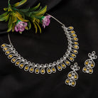 Yellow and white zircon stones create a dazzling contrast in this elegant necklace.
