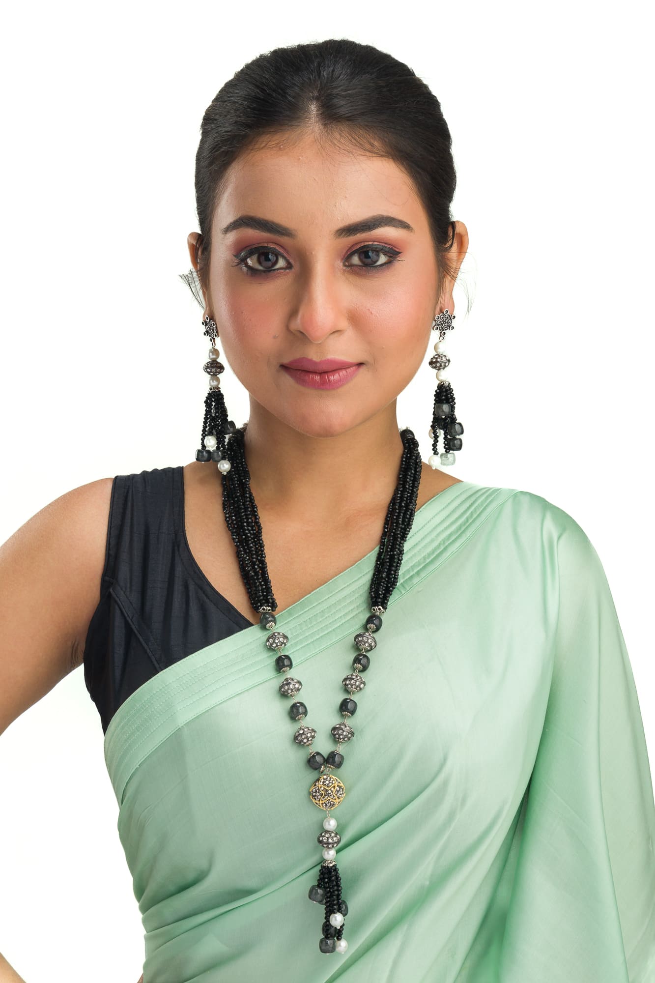 "Sophisticated black pearl long necklace set exudes elegant charm."
