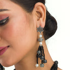 "Sophisticated black pearl long necklace set exudes elegant charm."
