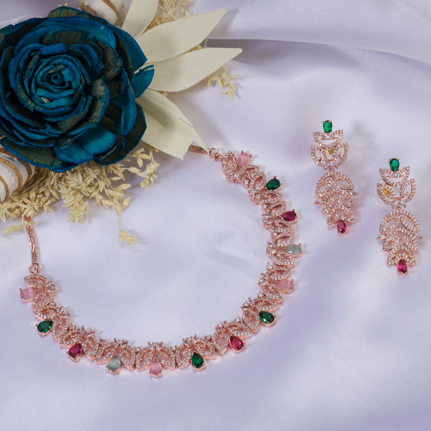 ELEGANT ROSE GOLD NECKLACE SET ADORNED WITH MULTI-COLOR ZIRCON STONES FOR A VIBRANT AND SOPHISTICATED LOOK.