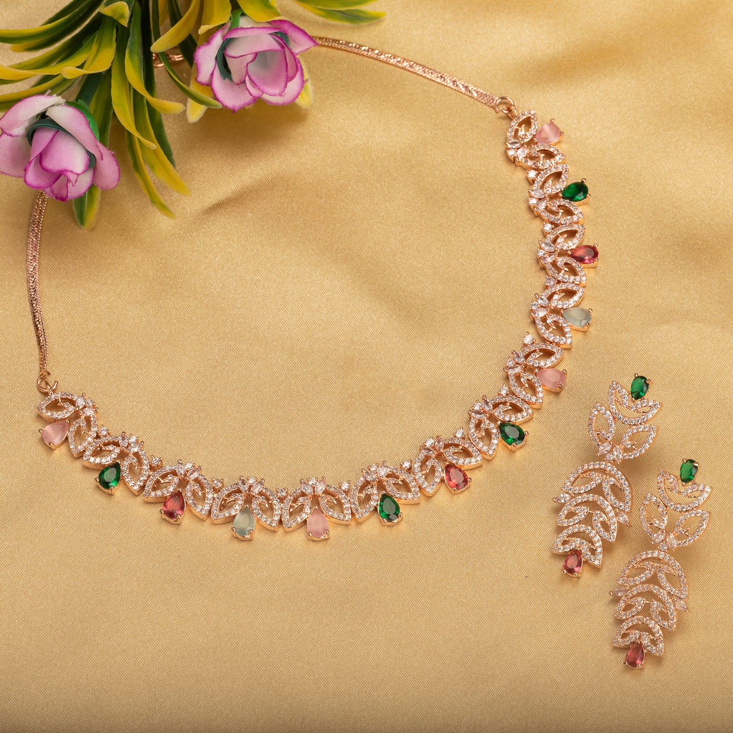 ELEGANT ROSE GOLD NECKLACE SET ADORNED WITH MULTI-COLOR ZIRCON STONES FOR A VIBRANT AND SOPHISTICATED LOOK.