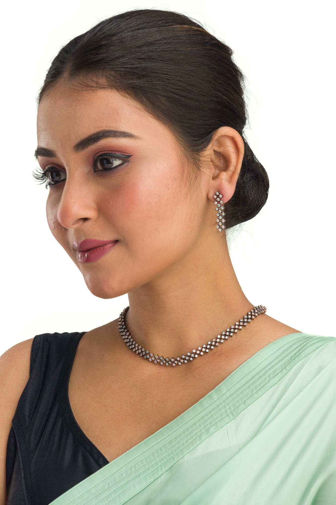 "Zircon short necklace sparkles with elegant refinement and shine."
