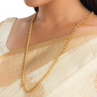 Classic gold-tone long necklace with sleek design for timeless elegance
