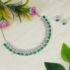 Green flower-shaped zircon necklace with silver polish for modern elegance.
