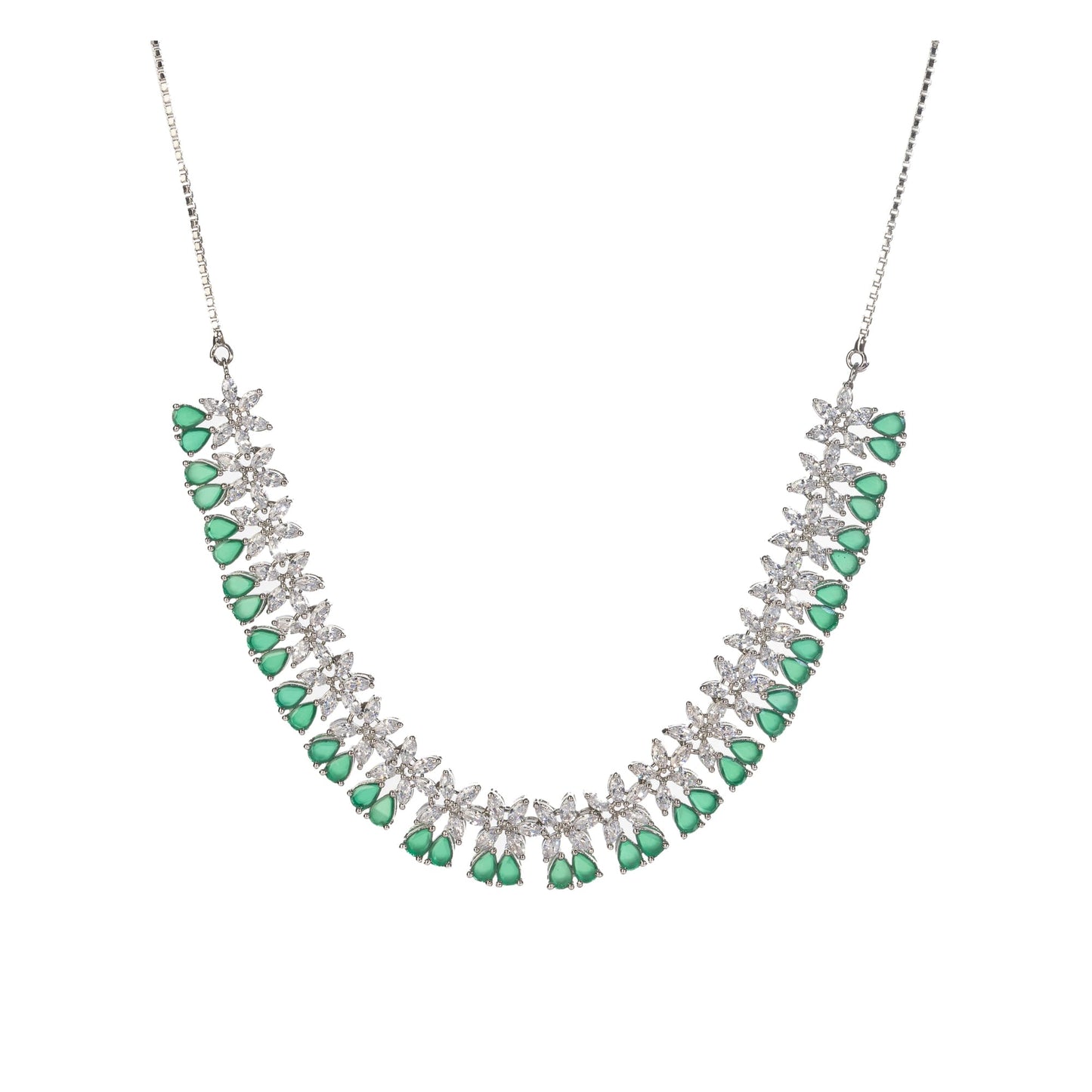 FLOWER-SHAPED ZIRCON GREEN WITH SILVER POLISH EXUDES A STRIKING, MODERN ELEGANCE.