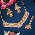 Exquisite pink Kundan bridal set for a stunning, elegant bridal look with intricate design
