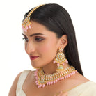 Exquisite pink Kundan bridal set for a stunning, elegant bridal look with intricate design
