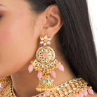 Exquisite pink Kundan bridal set for a stunning, elegant bridal look with intricate design
