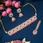 Regal maroon Kundan bridal choker set for a traditional, stunning bridal touch
