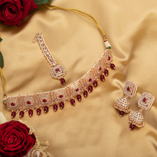 REGAL BRIDAL CHOKER SET FEATURING MAROON KUNDAN FOR A STUNNING AND TRADITIONAL TOUCH.