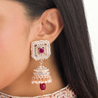 Regal maroon Kundan bridal choker set for a traditional, stunning bridal touch
