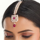 Regal maroon Kundan bridal choker set for a traditional, stunning bridal touch
