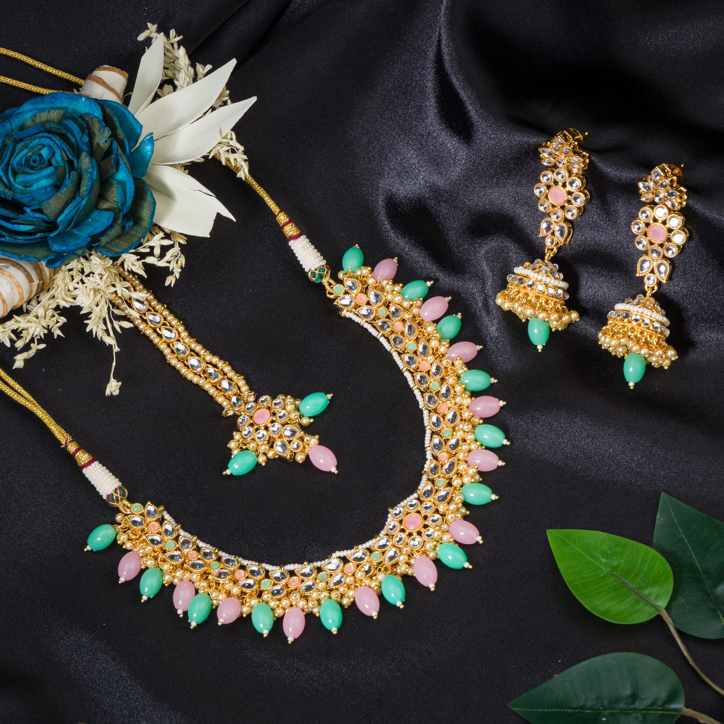 REGAL BRIDAL CHOKER SET FEATURING WITH GREEN AND PINK KUNDAN FOR A STUNNING AND TRADITIONAL TOUCH.